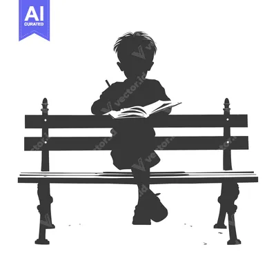 Silhouette of a Young Boy Studying on a Bench