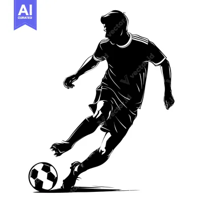 Silhouette of a soccer player kicking the ball