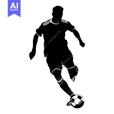 Silhouette of a Soccer Player Kicking the Ball