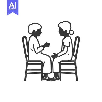 Two People Sitting In Chairs Facing Each Other