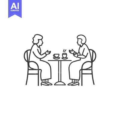Two Women Sitting at a Table with Coffee Cups