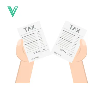 Two Hands Holding Tax Forms