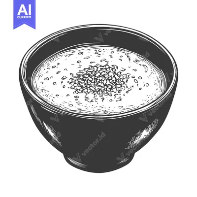 Aset premium populer: A bowl of creamy soup with a sprinkle of seeds