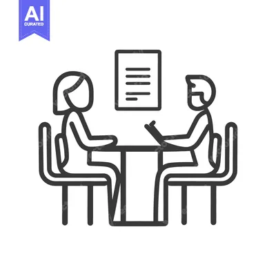Two people sitting at a table in an interview setting