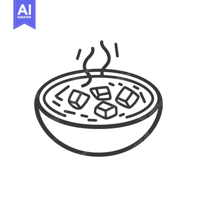 Steaming bowl of soup with cubed ingredients