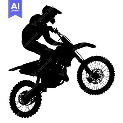 Silhouette of a Motocross Rider in Action