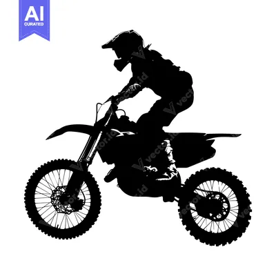 Silhouette of a Motocross Rider in Action