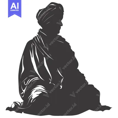 Silhouette of a man in traditional Indian clothing sitting in a medita