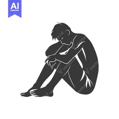 Silhouette of a man sitting alone, head bowed in sadness