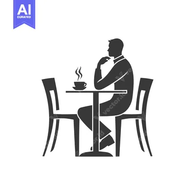 Silhouette of a Man Sitting at a Table with a Cup of Coffee