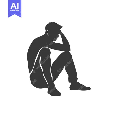 Silhouette of a Man Sitting with his Head in his Hands
