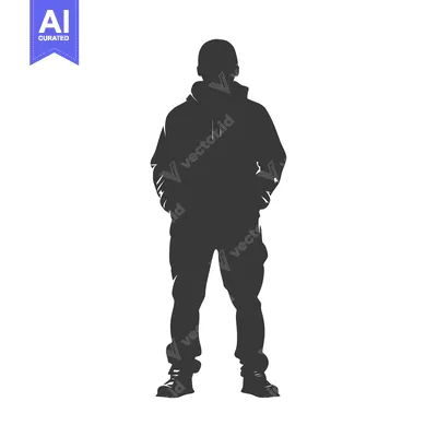 Silhouette of a Man Standing with Hands in Pockets