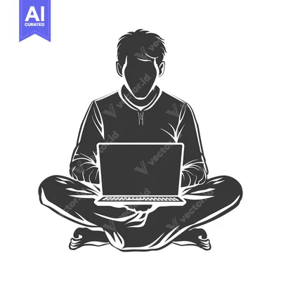 Silhouette of a Person Sitting Cross-legged Using a Laptop