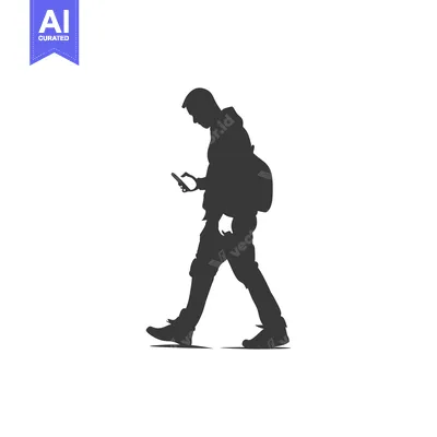 Popular premium asset: Silhouette of a Person Walking While Looking at Their Phone