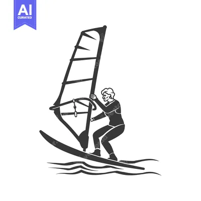 Silhouette of a windsurfer riding a wave
