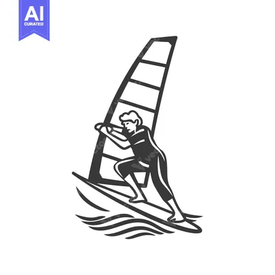 Silhouette of a windsurfer riding a wave