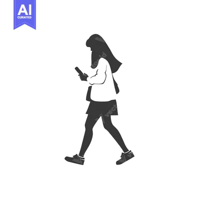 Silhouette of a Woman Walking While Using a Smartphone